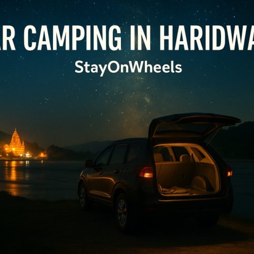 A quiet night by the Ganga — car camping in Haridwar where the river lights and temple glow meet under a starlit sky.
